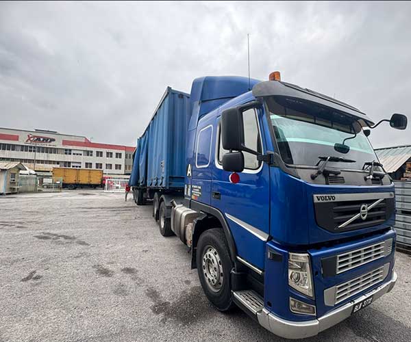 Logistics truck at warehouse loading bay